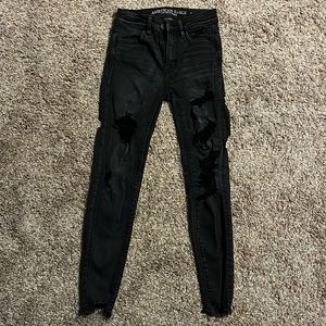 AMERICAN EAGLE size 0 ripped black stretch skinny jeans